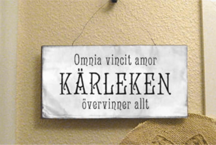 Karleken-overvinner-allt-skylt